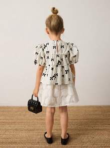 Maija Kids Maija Kids Áo cánh họa tiết hoa nhỏ giản dị rộng rãi trang trí nơ cho bé gái - màu đen - Xem 2