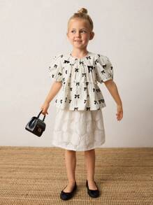 Maija Kids Maija Kids Áo cánh họa tiết hoa nhỏ giản dị rộng rãi trang trí nơ cho bé gái - màu đen - Xem 1