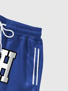 Manfinity EMRG 1pc Men's Shorts With Large White "UTAH" Letter Text, Left Side Features White Cartoon-Like Mascot Illustration, And White "1" Number Printed On Right Side Clothing Men Shorts Shorts Graphic Graphic Shorts Two Pieces Shorts Men's Shorts Outfits