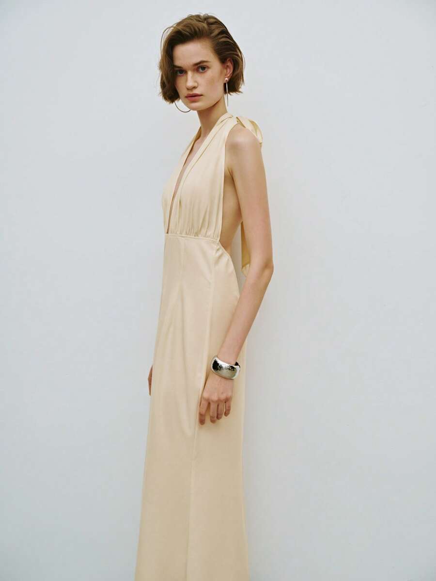 Lumivelle Vestido largo con cuello en V profundo, lazo y espalda descubierta