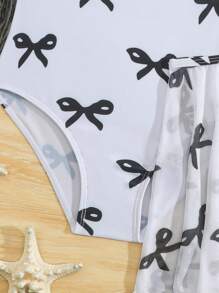 SHEIN Traje de baño de una pieza con camiseta de tirantes y estampado de lazos, con falda de malla, para niña preadolescente - Blanco y Negro - Ver 4