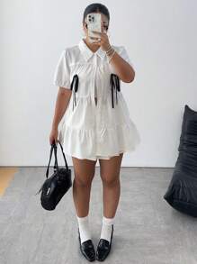 Flirla Chemise d'été minimaliste avec nœud décoratif et volant à l'ourlet pour femmes de grande taille