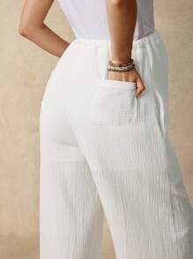 SHEIN Schwangere Frauen unifarbene Hose mit Tasche und Twist Taille, gerade Beinform, Lässig