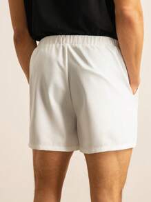 Manfinity Unisex Assorted Sizes Elastic Waist Patchwork Hem Men's Loose Fit Shorts