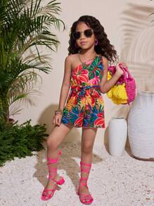 Mono de niña con estampado tropical y cuello halter, adecuado para la playa/vacaciones