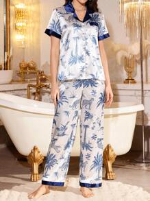 LuxeNights Set de pijama de 2 piezas para mujer con estampado floral azul oscuro, compuesto por un cárdigan de manga corta con cuello vuelto de satén sintético y pantalones, ideal para vacaciones