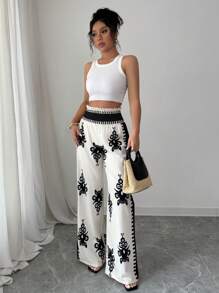 Elenzga Pantalones casuales elegantes con estampado completo y nudo en la cintura para mujer