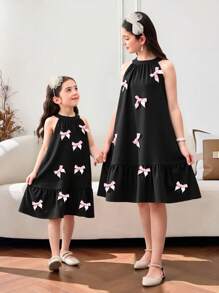 SHEIN Young Girl Woven Sleeveless Midi A-Line Cake Dress With Pink Bow Decor,Summer 7th Birthday Princess Party Wear,Mom & Daughter Matching Family Outfits - Black - View 1