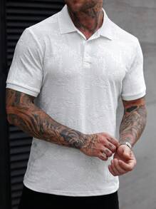 Manfinity Homme Camisa polo de manga corta casual para vacaciones con cuello y puños de tejido de punto texturizado, tela con estampado de paisaje jacquard