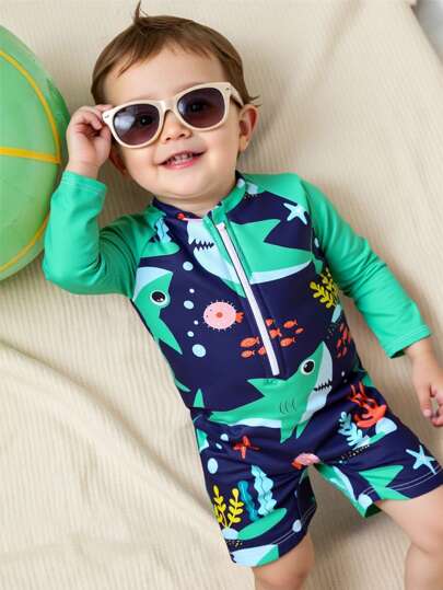 Infant Shark Print Zipper Rash Guard, Ocean Life Themed One-Piece Swimsuit. Must-Have Fashionable Item For Summer Beach Vacation. Long Sleeve Design, Blue Contrast Color, Adorable Shark & Ocean Creature Cartoon Pattern. Lively And Vibrant. Suitable For Adorable Baby Boys To Wear When Playing At The Beach Swim Suits For Kids Toddler Swim Suits For Kids Swimsuits For Toddlers Swimming Suits For Baby S Swimming Suits For Baby