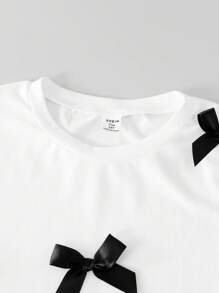 少女休闲优雅图案 T 恤套装，黑白撞色蝴蝶结装饰圆领 T 恤和喇叭长裤，适合度假、上学、春夏季 - 黑色 - 查看 3