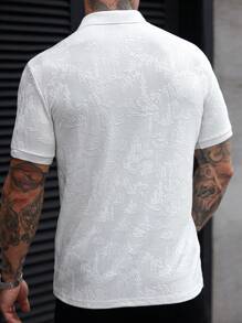 Manfinity Homme Camisa polo de manga corta casual para vacaciones con cuello y puños de tejido de punto texturizado, tela con estampado de paisaje jacquard