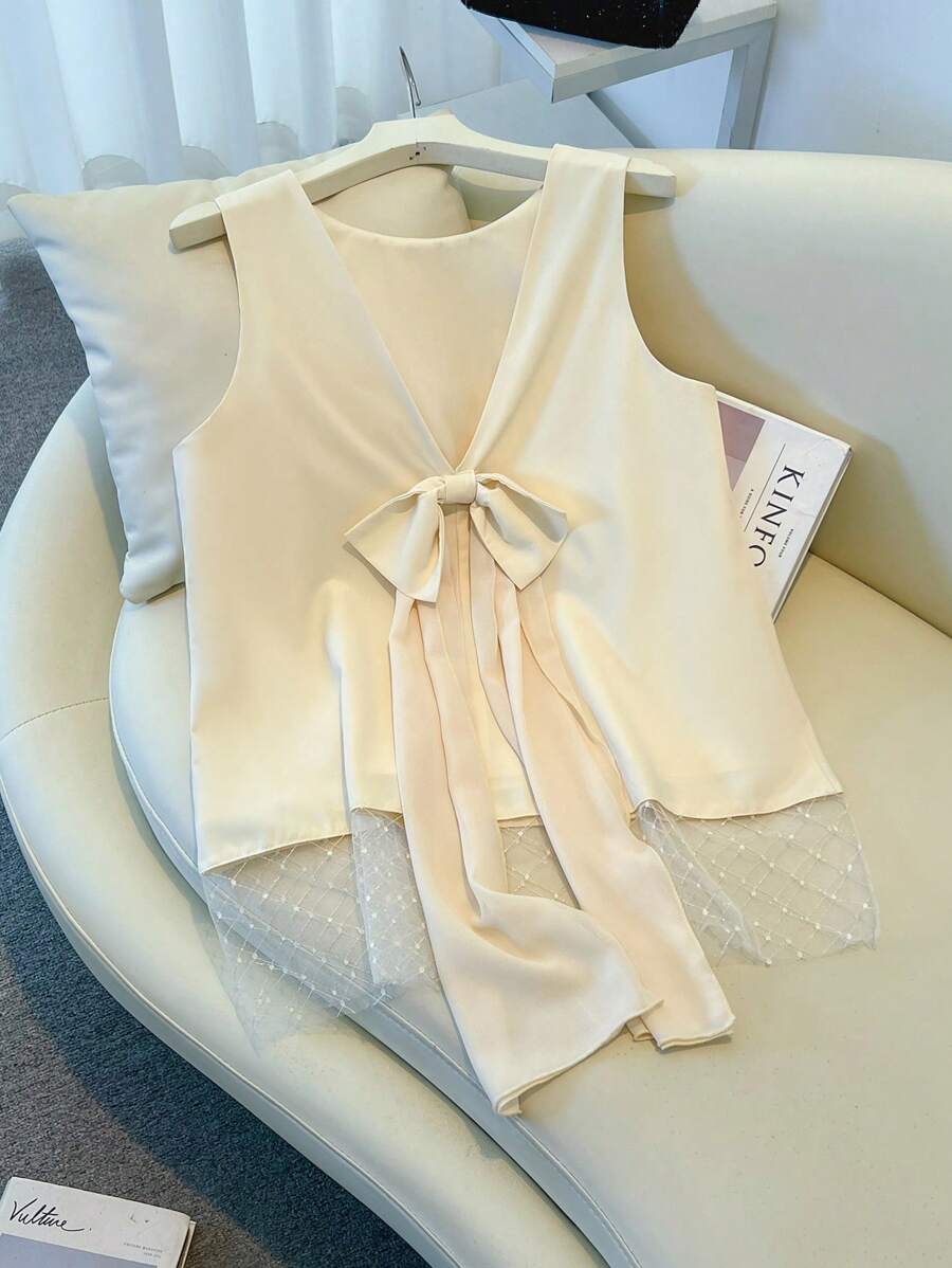 Franclia Áo cánh chữ A không tay nơ sau lưng màu mơ thanh lịch hàng ngày - Màu be - Xem 1
