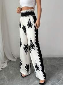 Elenzga Pantalones casuales elegantes con estampado completo y nudo en la cintura para mujer