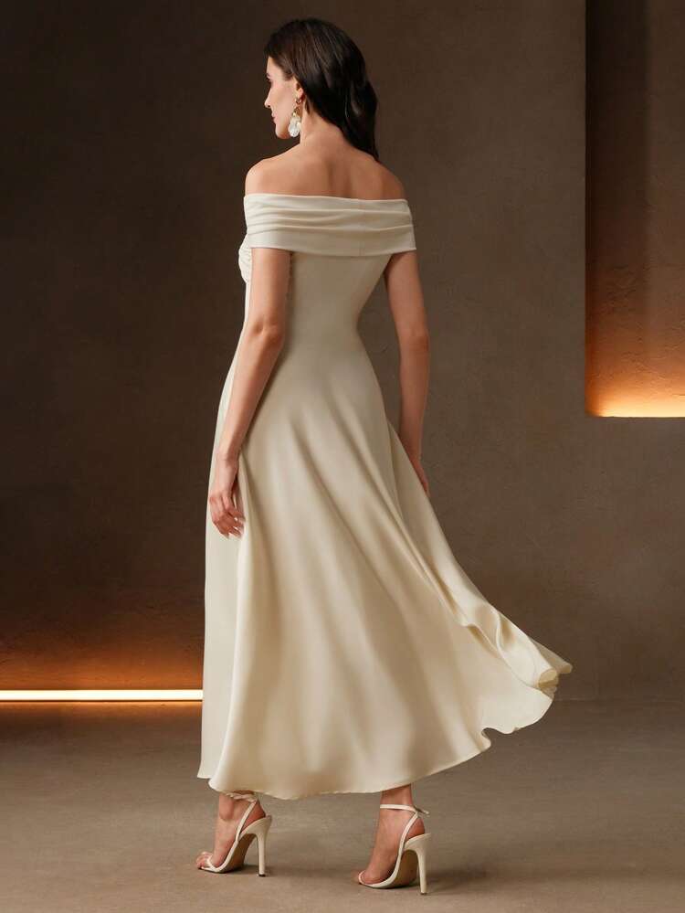 Vestido elegante y sexy de color albaricoque con decoración de nudo y hombros descubiertos, adecuado para bodas y graduaciones