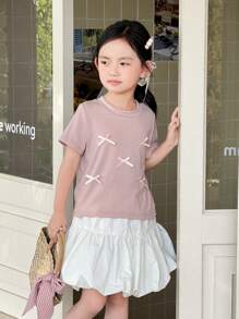 Zikori Zikori 2 Pezzi Completo da Ragazza Casual con Fiocco Decorativo Composto da maglietta a Maniche Corte a Girocollo Rosa e Minigonna Bianca