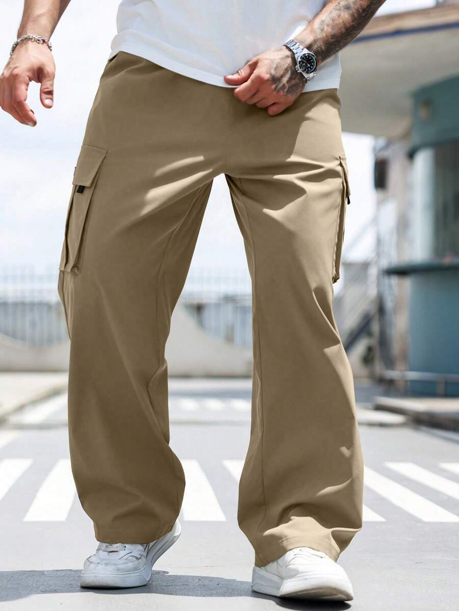 Manfinity Homme Pantalones casuales sueltos de unicolor tipo cargo para hombres de talla grande, otoño - Caqui - Ver 1