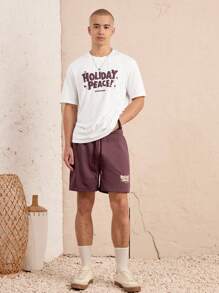 Manfinity VCAY Set de 2 piezas con camiseta de manga corta de cuello redondo de corte holgado estampada y pantalones cortos con cintura elástica para hombre