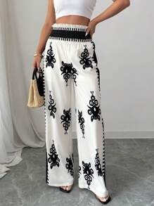 Elenzga Pantalones casuales elegantes con estampado completo y nudo en la cintura para mujer