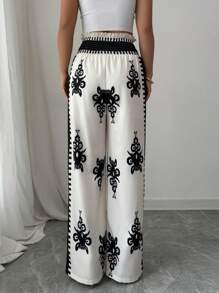 Elenzga Pantalones casuales elegantes con estampado completo y nudo en la cintura para mujer