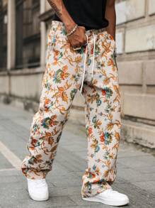 Manfinity Hypemode Pantalones con textura jacquard de estilo floral azul clásico y de gran con cintura elástica. Perfectos para la primavera y el verano, perfectos para las vacaciones en la playa, un regalo ideal para su novio o esposo. Pantalones con estampado, trajes de playa hawaianos para hombres, ropa de hombre, pantalones de hombre, ropa larga de hombre, pantalones cortos de hombre, ropa larga de hombre