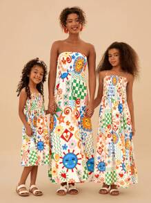 SHEIN Vestido informal con tirantes de espagueti con estampado floral pequeño para niña preadolescente de vacaciones en la playa, conjunto a juego de mamá e hija (se venden 3 piezas por separado)