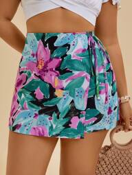 Travachic Shorts casuales de playa para mujer talla grande con estampado de silueta de plantas coloridas y lazo lateral, pantalones culotte holgados y florales románticos para el verano y la playa