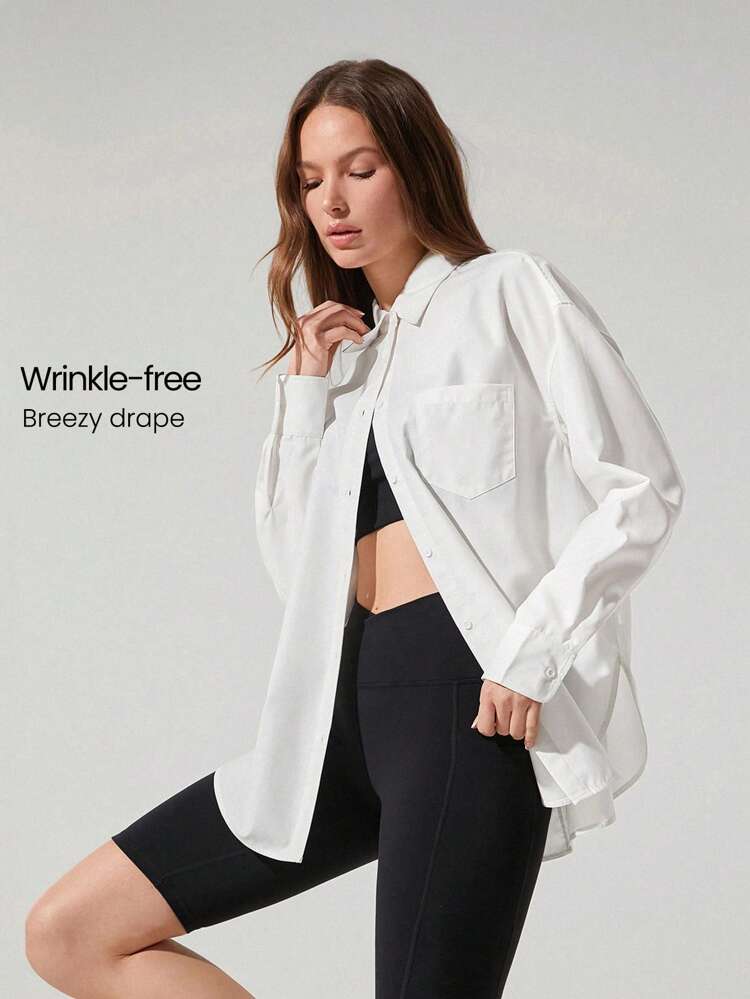 Chemise boutonnée surdimensionnée à manches fendues et poche de poitrine, pour un port casual quotidien en studio