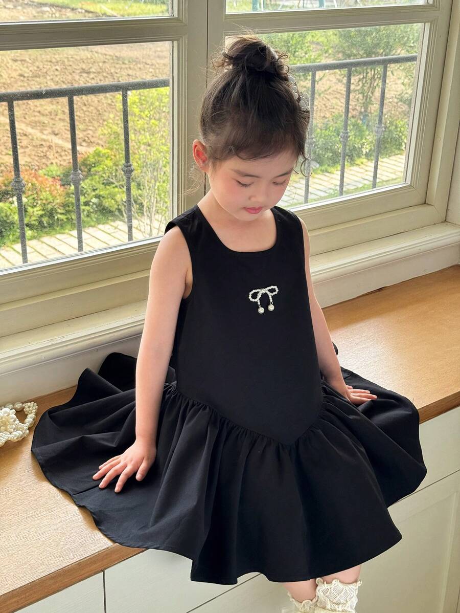 SHEIN 年轻女孩优雅蝴蝶结装饰背心裙，适合女孩日常穿着、节日、家庭聚会和学校场合，春夏季，可爱、优雅、甜美、时尚