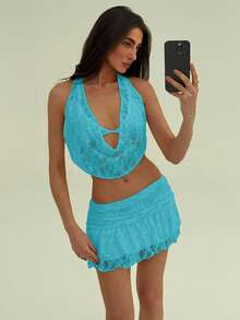 Aloruh طقم صيفي يتكون من توب حلقة منخفض الظهر متدلي الرقبة مزين بالدانتيل وتنورة قصيرة منخفضة الخصر من لون واحد - الأزرق - مشاهدة 7