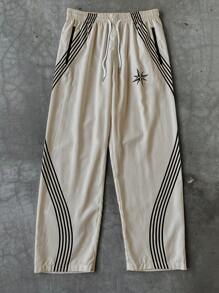 Manfinity Hypemode Pantalones casuales con estampado de rayas, cintura con cordón y bolsillos para hombres