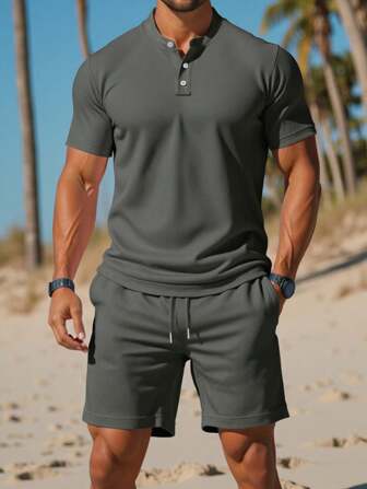 Manfinity Dauomo Ensemble polo à manches courtes de couleur unie et short à taille avec cordon de serrage et poches pour homme