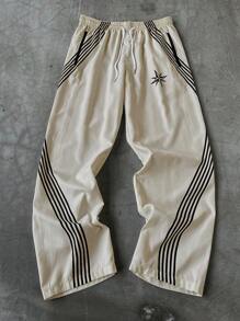 Manfinity Hypemode Pantalones casuales con estampado de rayas, cintura con cordón y bolsillos para hombres