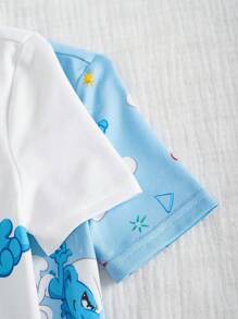 The Smurfs X SHEIN Ensemble Top manches courtes décontracté à épaules tombantes et pantalon rayé bleu pour jeune garçon, motif de bande dessinée