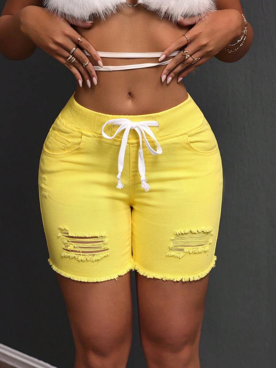 SHEIN SXY Pantalones cortos de mujer de mezclilla con efecto desgastado, apropiados para el verano