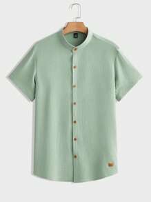 Manfinity RelaxMax Camisa casual de verano de manga corta con botones delanteros lisos para hombres