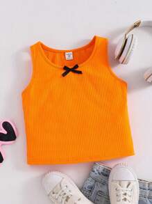 SHEIN Parte superior de tirantes con lazo frontal en estilo casual de calle para niñas preadolescentes