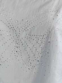 Nöista Light Blue Top With Adjustable Straps And Butterfly-Shaped Rhinestone Details. Short And Flowy Design, Perfect For Special Occasions Or Evening Outings.