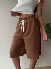 SHEIN EZwear Pantalones cortos holgados tejidos de color café con estilo deportivo, para el verano