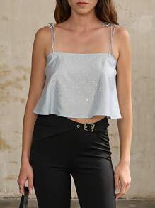 Nöista Light Blue Top With Adjustable Straps And Butterfly-Shaped Rhinestone Details. Short And Flowy Design, Perfect For Special Occasions Or Evening Outings.