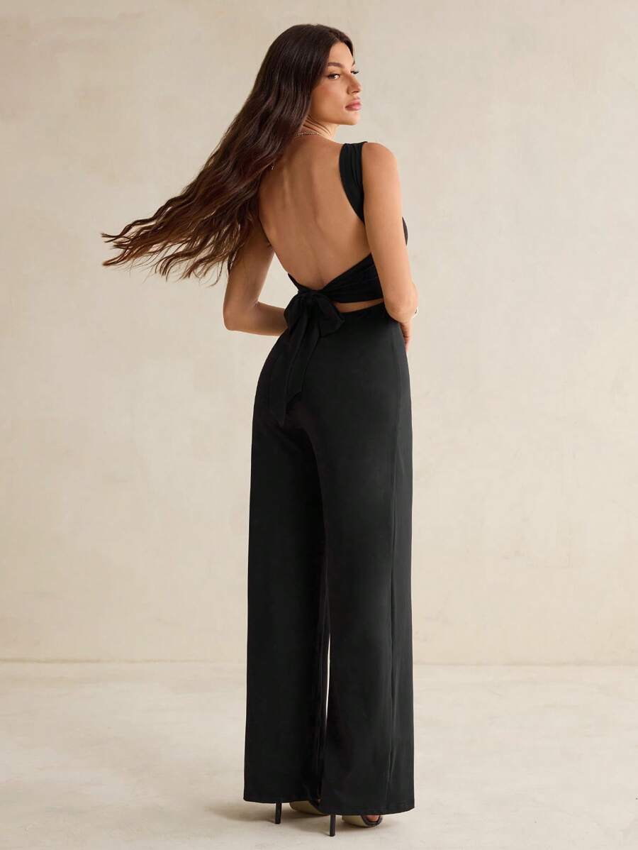 SHEIN Tall Bộ đồ liền thân ống rộng không dây buộc nơ hở lưng màu đen thanh lịch mùa xuân và mùa hè, trang phục hẹn hò hàng ngày, trang phục dự tiệc, trang phục lót thanh lịch cho phụ nữ, trang phục đi chơi, bộ đồ liền thân bất đối xứng, bộ đồ liền thân ngày lễ tình nhân, bộ đồ liền thân hàng ngày, bộ đồ liền thân thanh lịch - màu đen - Xem 1