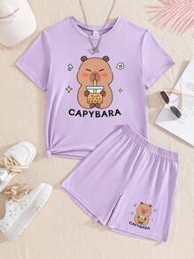 SHEIN Conjunto de 2 piezas para niñas, camiseta de manga corta con cuello redondo y estampado de Capibara tomando bubble tea, y pantalones cortos, conjunto de verano casual y lindo de color morado para niños mayores - Morado - Ver 2