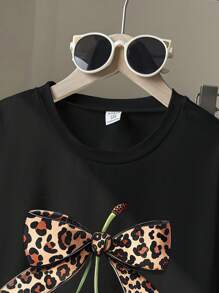 女童豹纹、蝴蝶结和樱桃图案圆领短袖 T 恤和针织紧身喇叭裤可爱两件套服装，黑色，夏季 - 黑色 - 查看 3