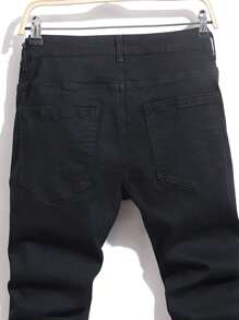 Manfinity EMRG Jeans slim fit con bloques de color y parches de talla grande para hombres