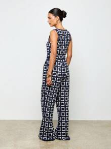 AiiRZ Crochet Knit Waistcoat And Flared Trousers Set