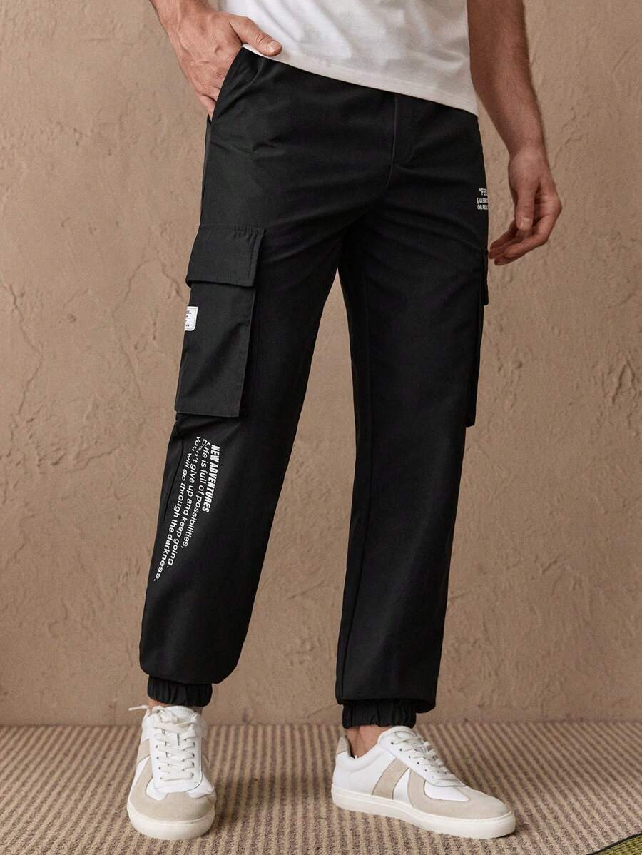 Manfinity VCAY 男士标语印花工装裤，带口袋和抽绳腰带，梭织长裤，黑色工装街头裤，街头服饰，秋季