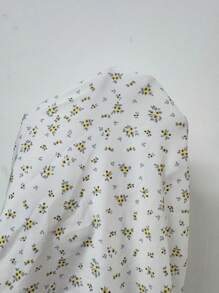 Roylia Short Sleeve Open Shoulder Ditsy Floral Twist Front Bodysuit