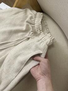 SHEIN LUNE Pantalones fluidos de trabajo de lino para mujer, pantalones de verano de tela de lino color albaricoque con inserto de encaje con volantes, cintura elástica, pantalones sueltos para mujer, pantalones de lino estilo "Old Money" europeo para el verano en el aeropuerto - Albaricoque - Ver 5
