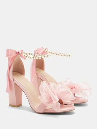 CUCCOO CURVES Sandalias de tacón alto rosa para mujer, de estilo Lolita con lazo, cuentas y cadena de perlas, cinta de seda y tacón ancho, punta redonda, tallas grandes