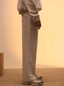 Musero Pantalón de chándal de pierna recta con detalles de pinzas, parche con marca, solo para primavera, verano, vacaciones, Pascua, estilo callejero Y2K